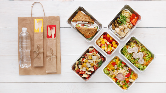 food in grab n go boxes with paper bag for sustainable carrying