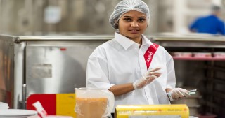 sodexo employee in kitchen practising food safety 